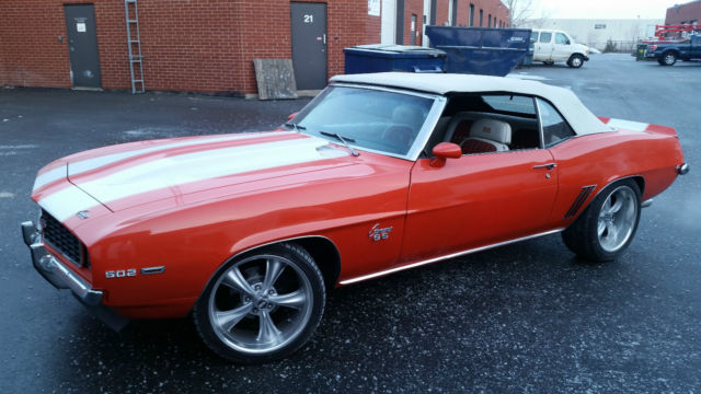 , 1969 Chevrolet Camaro SS Convertible. Orange with white stripe, 2 door. 1969 Chevrolet Camaro SS