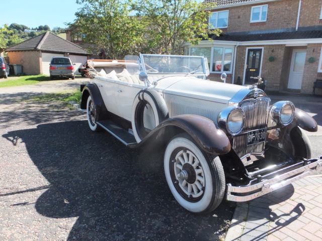 1928 Buick MODEL 28-55 DELUXE SPORT open TOURING  twin sidemounts.