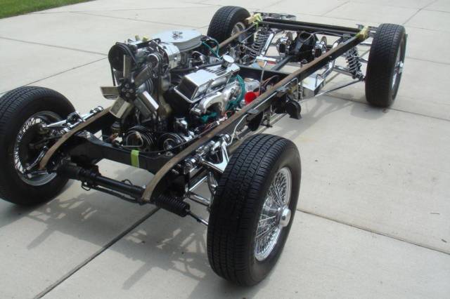 1930 Model A Ford 5 window coupe on a chromed Jaguar XKE chassis. Chevy 305 V8. 1930 Ford Model A