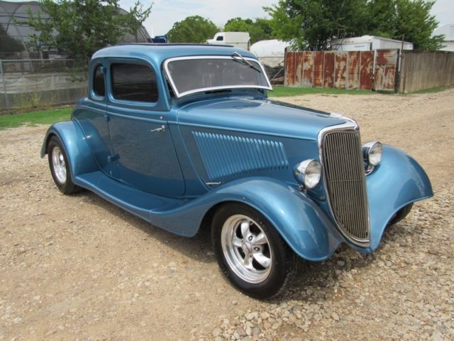 1934 FORD 5 WINDOW COUPE- HENRY FORD STEEL BODY. 383 STROKER, 2X4 12 BOLT. A/C 1934 Ford 5 window coupe deluxe