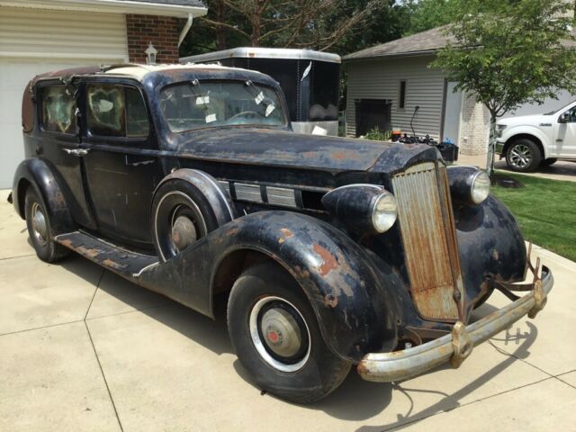 1937 Packard Super 8 1501 Formal Sedan with Divider Window and a Jump Seat 1937 Packard Super 8 1501 Formal Sedan With Divider Window and Jump Seat