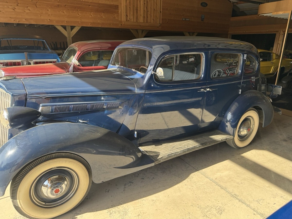 1937 Packard 115-C Touring Sedan - photo 2