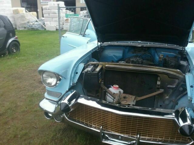1957 Cadillac DeVille sedan 4 door hardtop robin egg blue white top all - photo 3