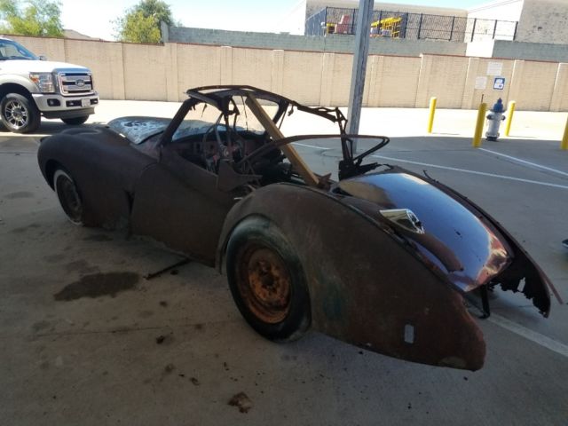 1957 Jaguar XK XK140 DHC - photo 7