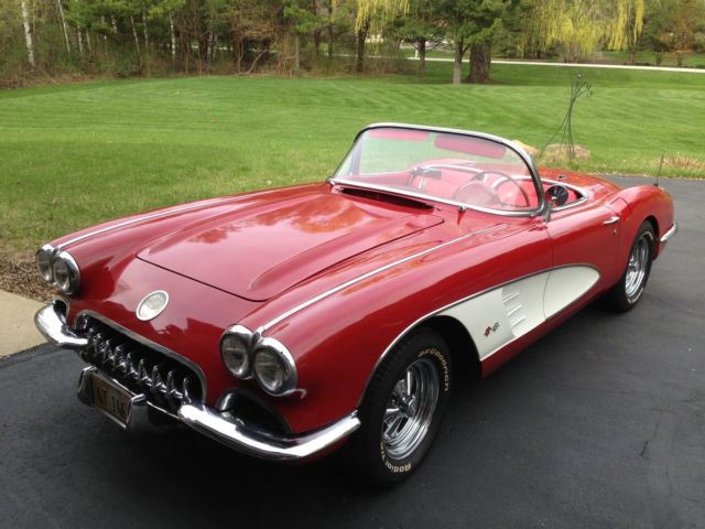1960 Corvette. Red/Red, white coves. NOM 327 4-speed 1960 Chevrolet Corvette