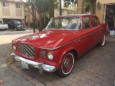 1960 Studebaker Lark 4 Door Sedan V8 Automatic 3 Speed with Red & White Exterior 1960 Studebaker Lark 4 Door Sedan