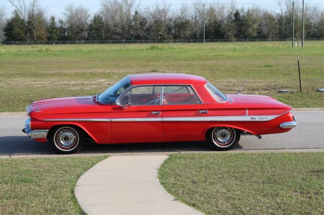 1961 Restored Roman Red Chevy Impala 1961 Chevrolet Impala 4-Door Sport Hard Top (No Center Post)