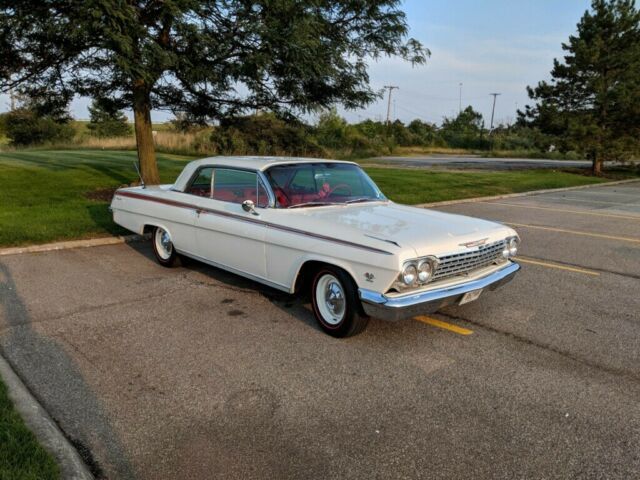 1962 Chevy Impala, 409, dual quad, 4-speed, air conditioning, PS, air shocks 1962 Chevrolet Impala sport coupe
