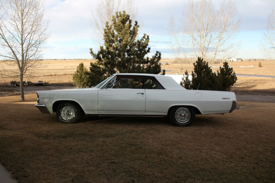1963 restored beauty. White with red interior, powdercoated frame. 1963 Pontiac Grand Prix