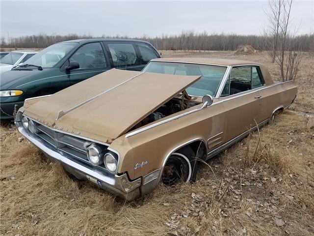 1964 Oldsmobile Starfire Gold Automatic 1964 Oldsmobile Starfire --