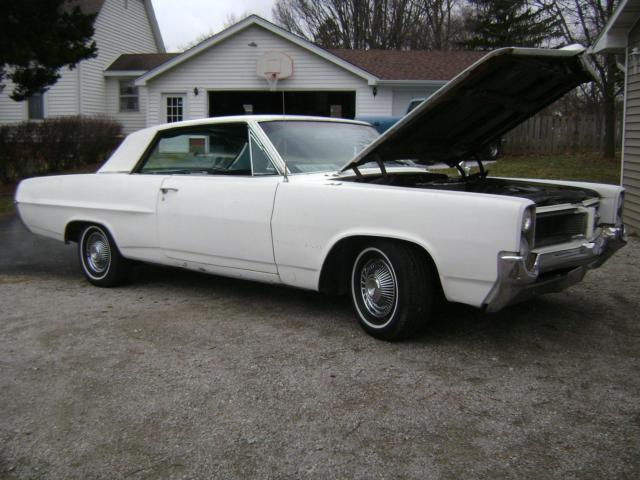 1964 Pontiac Grand Prix Base 6.4L 6376CC 389Cu 39448 Miles White Coupe Base 6.4L 1964 Pontiac Grand Prix Base 6.4L 6376CC 389Cu