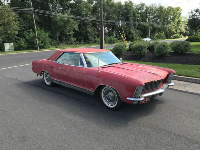 1965 Buick Riviera 425 dual quad Flame red with Deluxe Black interior 1965 Buick Riviera