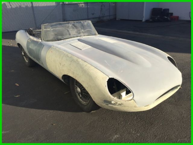 1965 JAGUAR E-TYPE XKE SERIES ONE 4.2 LITER ROADSTER. WHITE ON BLACK. 4-SPEED. 1965 Jaguar E-Type