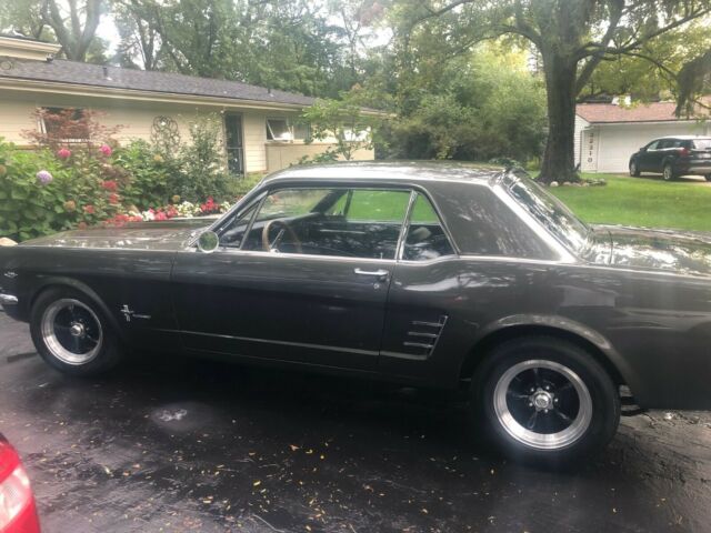 1966 Ford Mustang Coup with Eleanor paint with black stripes. 1966 Ford Mustang