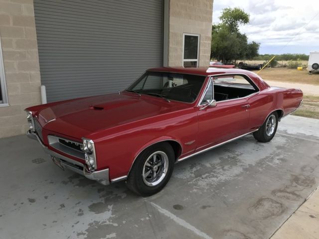 1966 Pontiac GTO 389 4bbl 4 speed PS PWR brakes 81876 Miles Regimental Red Hardt 1966 Pontiac GTO 389 4bbl 4 speed PS PWR brakes