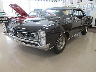 1966 PONTIAC GTO ( true ) in black on black on black.389 w / 4 speed 1966 Pontiac GTO