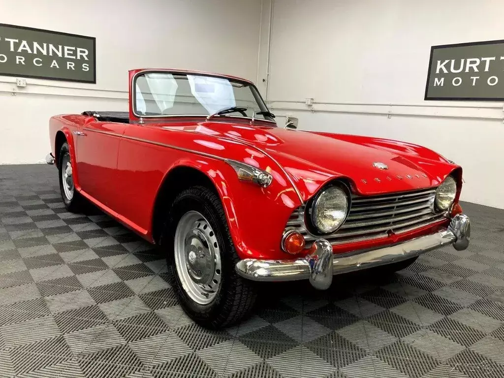 1966 TRIUMPH TR4A. LIVE AXLE. GOOD DRIVER’S CONDITION CAR SHOWING 114,832 MILES. 1966 Triumph TR4A 1966 TRIUMPH TR4A. SIGNAL RED WITH BLACK TRIM, TOP, TOP BOOT