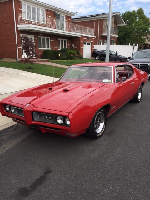 1968 GTO 4 speed Solar Red 1968 Pontiac GTO