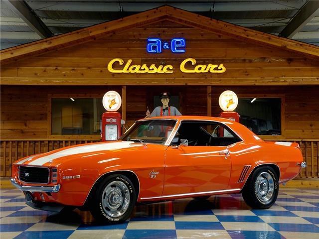1969 Chevrolet Camaro 454 cui Big Block – Orange / White 1969 Chevrolet Camaro 454 cui / 4 speed manual