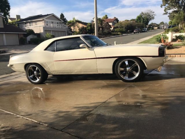 1969 Chevrolet Camaro resto-mod cream color, black and red stripe 1969 Chevrolet Camaro black/red
