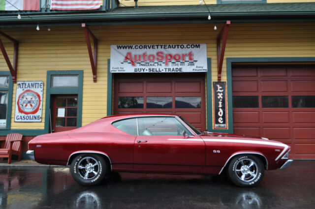 1969 Chevrolet Chevelle Frame Off Restored Cranberry Red/Pearl White 4sp A 1064 1969 Chevrolet Chevelle Frame Off Restored Cranberry Red/Pearl White 4sp A