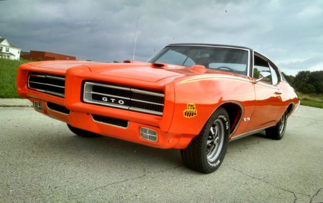 1969 Pontiac GTO with additional factory "The Judge" options added 1969 Pontiac GTO Original Hideaway Headlight Genuine 242 Goat