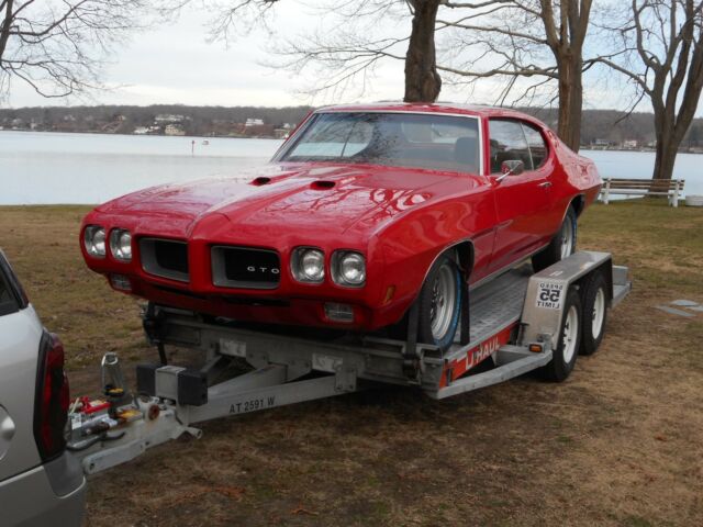 1970 Pontiac GTO with RAIV top end. Red 4-spd. Frame Off Restored. 1970 Pontiac GTO GTO