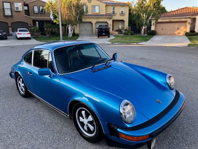 1974 1975 1976 1977 1978 1979 1980 1981 1982 1983 Porsche 911 Coupe Caribe Blue 1976 Porsche 911 COUPE CARIBE BLUE WITH C.O.A & SERVICE RECORDS