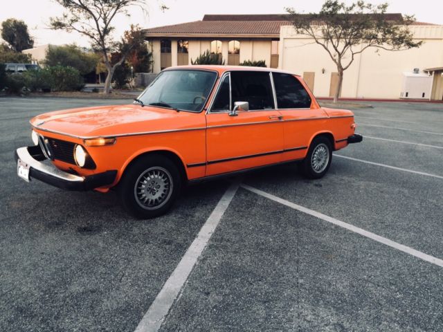 1974 BMW 2002; 4sp, Inka Orange/Black interior, no sunroof, all stock, 186k, 1974 BMW 2002