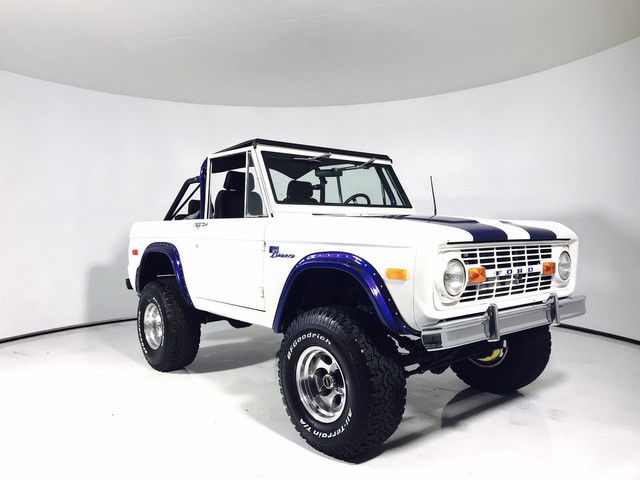 1974 Ford Bronco Frame Off Restoration | Satin White | Blue Stripes Satin White 1974 Ford Bronco Frame Off Restoration