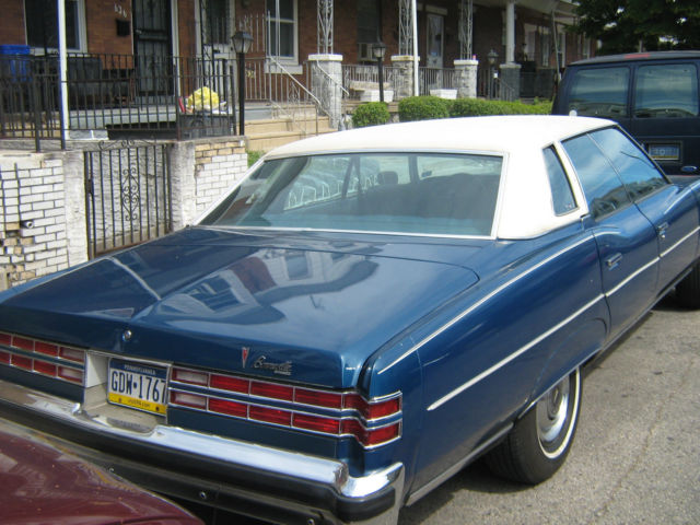 1976 4- dr hard top , blue, very good condition, garage kept, white vinyl top 1976 Pontiac Bonneville