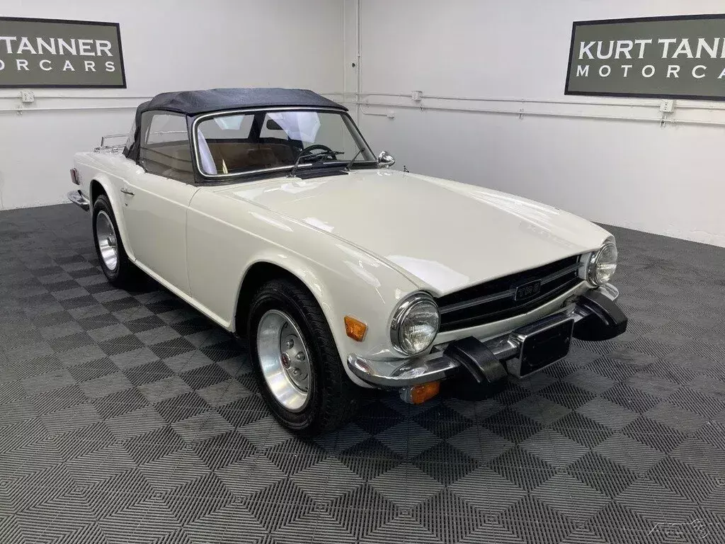 1976 TRIUMPH TR6. WELL PRESERVED, ORIGINAL DRIVER WITH 54,335 MILES. 1976 Triumph TR-6 1976 TRIUMPH TR6 CONVERTIBLE. NEW WHITE WITH BEIGE TRIM