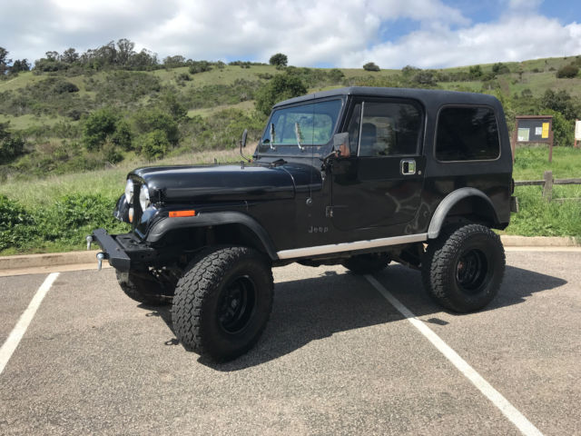 1983 CJ7, fuel injected, black, lifted, new interior, nice shape, No reserve, $1 1983 Jeep CJ