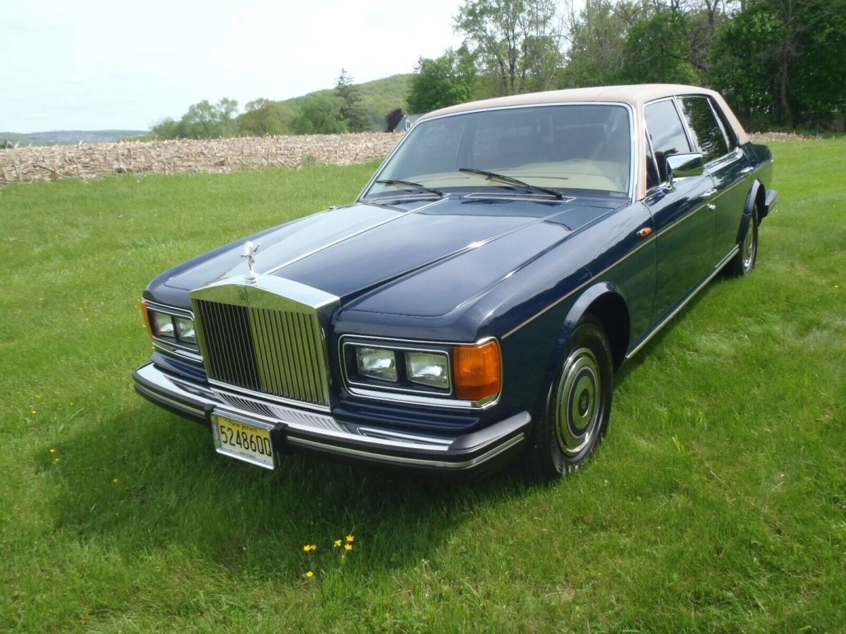 1983 Rolls-Royce Sliver Spur 18K mi. Dark Blue ad Saddle Tan 1983 Rolls-Royce Silver Spirit/Spur/Dawn BLUE AND TAN LEATHER