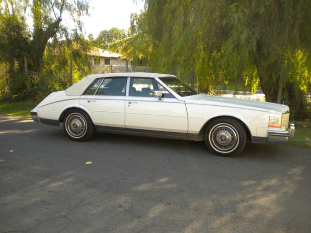 1985 CADILLAC SEVILLE looks & runs good, Vinyl Top White on White 4-Dr Sedan 1985 Cadillac Seville Base Sedan 4-Door