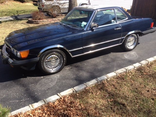 1986 Mercedes Benz 560SL Class Blue on Blue Convertible with Matching Hard Top 1986 Mercedes-Benz SL-Class Chrome as per original