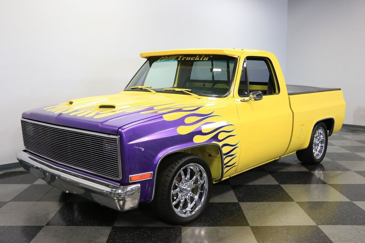 1987 GMC C1500 Sierra with attention getting paint and striping. 350 short block 1987 GMC Sierra 1500 Flames and hand painted striping