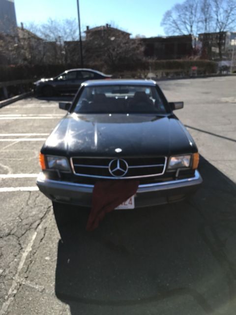 1987 Mercedes-Benz 500-Series Black exterior and gold interior - photo 3