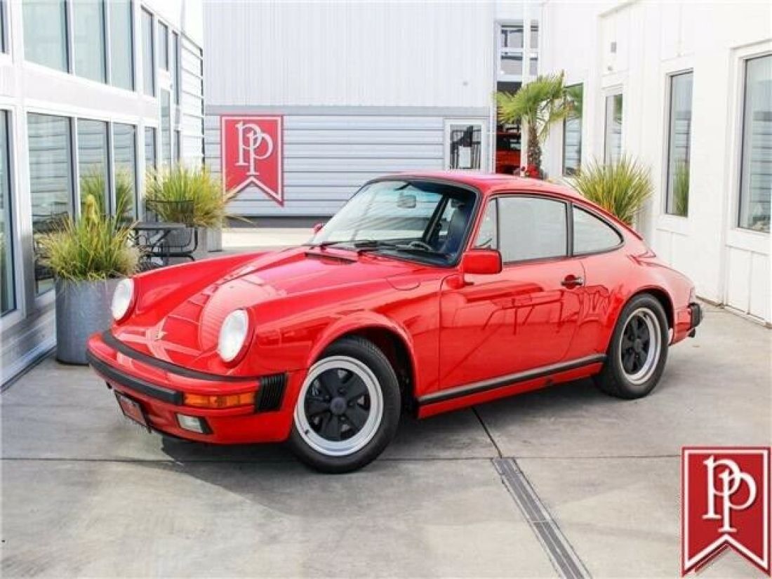 1988 Porsche 911 Carrera, 23,721 Miles, Guards Red on black 1988 Porsche 911 Carrera