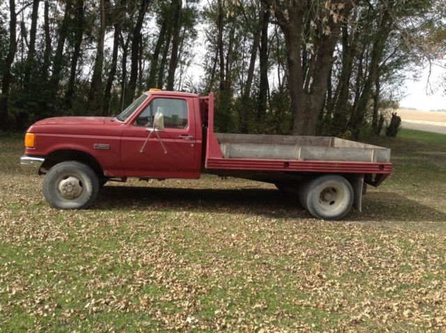 1988 RED FORD F 350 CUSTOM-4 WD-8 CYL-5 SPEED ,7.3 DIESEL FLATBED, GREAT PULLER. 1988 Ford F-350