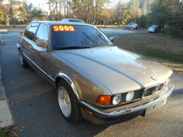 1989 BMW 750i, bronzit, red leather, V-12 purrs, runs and drives very well. 1989 BMW 7-Series leather