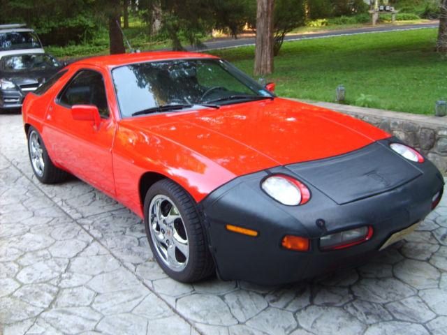 1990 Guards Red Porsche 928 S4 with chrome turbo twist Porsche wheels 1990 Porsche 928 S4