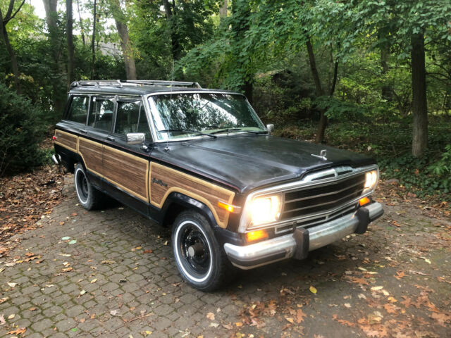 1990 Jeep Grand Wagoneer 4WD 5.9L V-8 Midnight Blue Metallic 1990 Jeep Wagoneer