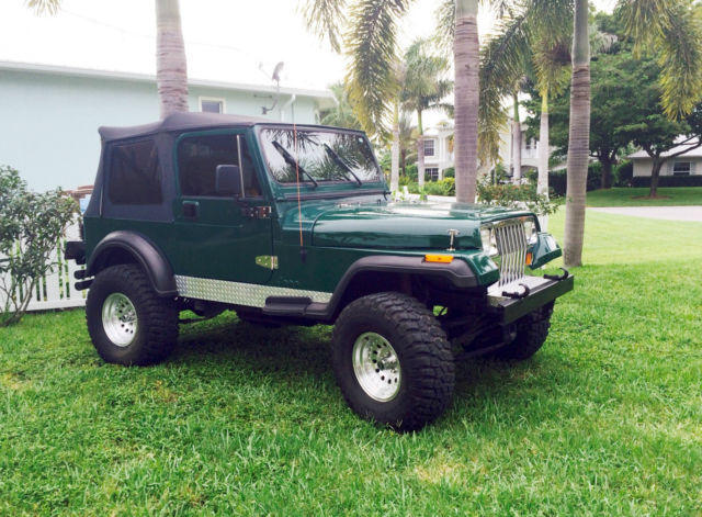 1990 Jeep Wrangler. Hunter green with black soft top. 1990 Jeep Wrangler