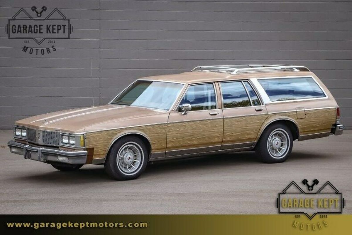 1990 Oldsmobile Custom Cruiser Wagon Beige/Wood Grain Station Wagon 5.0L V8 9067 1990 Oldsmobile Custom Cruiser Wagon