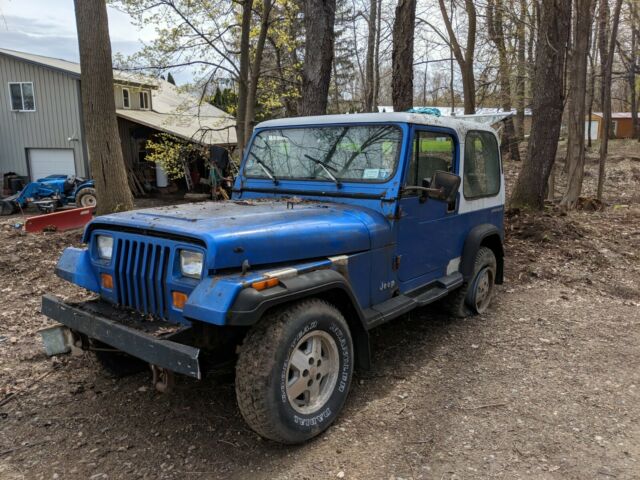 1991 Blue Jeep Wrangler, V6, 214,168 miles (Currently doesn't run) 1991 Jeep Wrangler