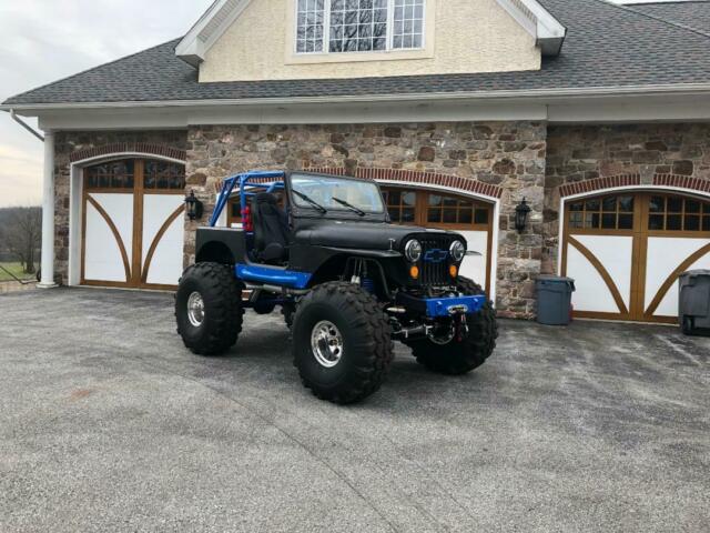 1991 Jeep Wrangler, 1973 Bronco, 502 Ram Jet BB Chevy Monster, just finished! 1991 Jeep Wrangler