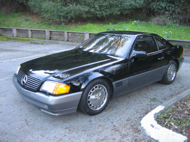 1992 MBZ 500 SL Roadster. 5.0 V8 32V. 322 Horsepower 4 speed auto. Black/ Tan 1992 Mercedes-Benz SL-Class