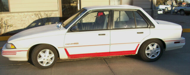 1993 CHEVY CAVALIER 4-DOOR Good mileage, 2.2 L, 4-cyl. Have all Service Records 1993 Chevrolet Cavalier Red stripes
