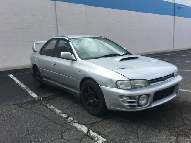1993 Subaru Impreza WRX STI RHD 1973 Subaru Impreza STI